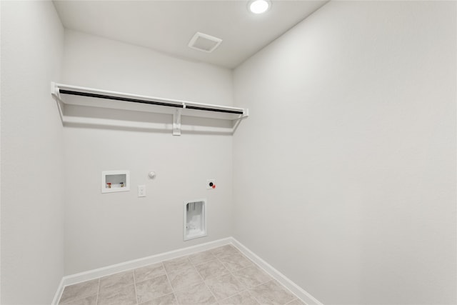 laundry area featuring hookup for an electric dryer, hookup for a gas dryer, hookup for a washing machine, and light tile patterned floors