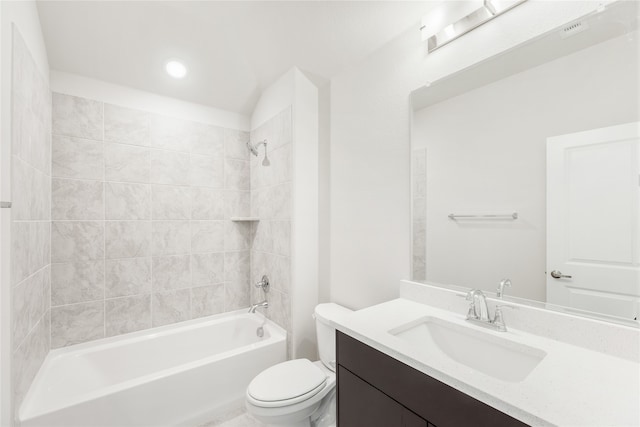 full bathroom with tiled shower / bath combo, vanity, and toilet