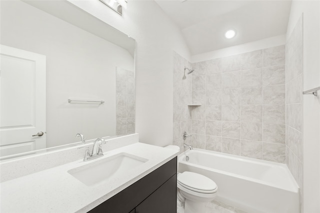 full bathroom with tiled shower / bath combo, lofted ceiling, vanity, and toilet