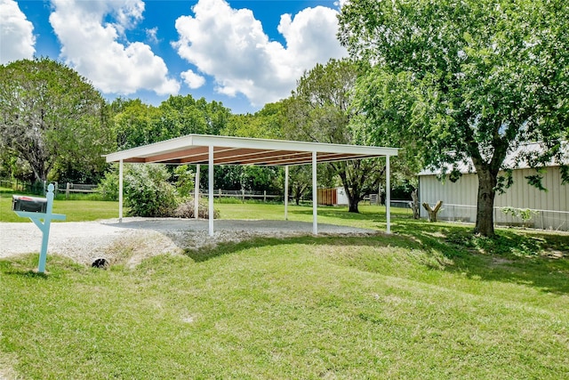 view of property's community featuring a yard