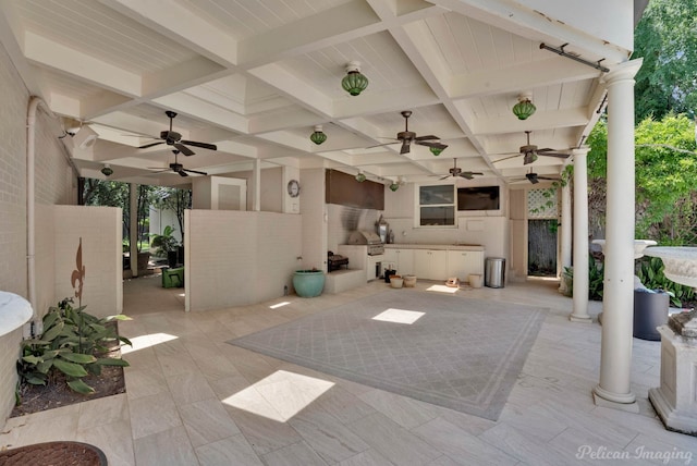 view of patio with ceiling fan