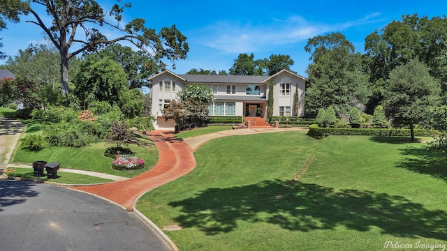 view of front of home with a front yard