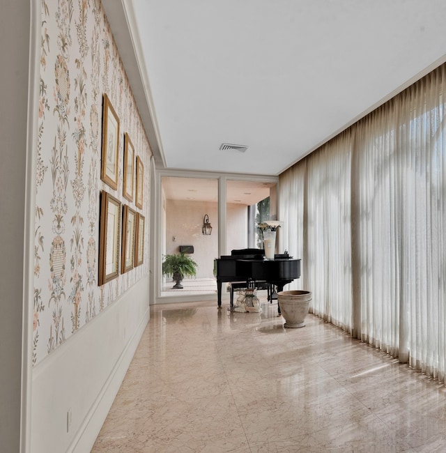 tiled office space with a wealth of natural light and floor to ceiling windows