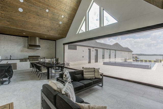 living room with a towering ceiling