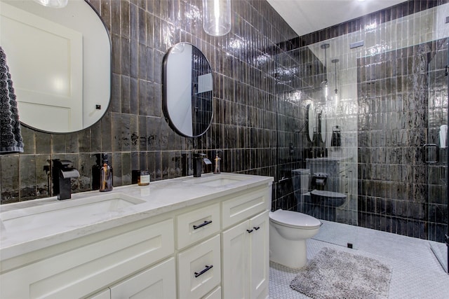 bathroom featuring tile patterned floors, toilet, decorative backsplash, a shower with shower door, and tile walls