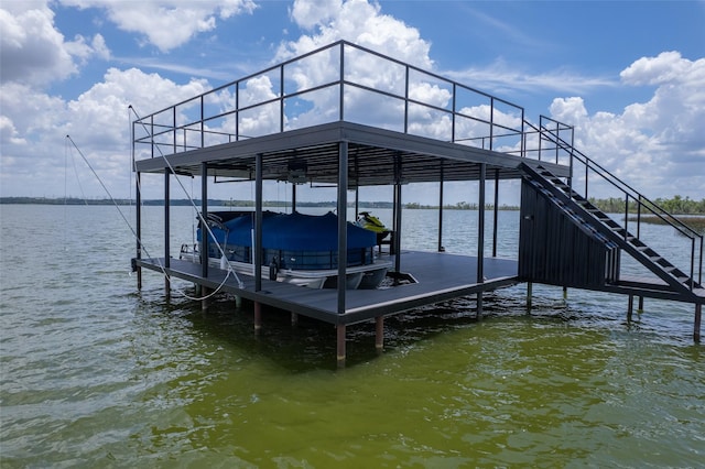 view of dock with a water view