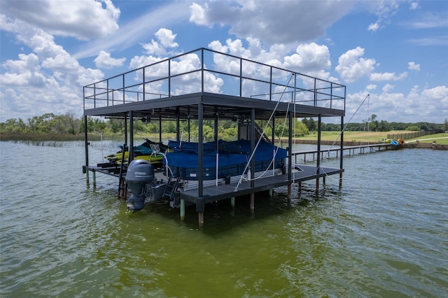 dock area with a water view