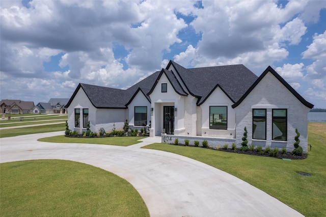 view of front of house with a front lawn