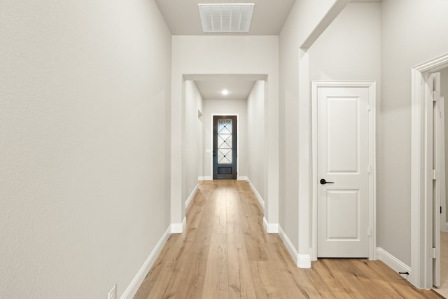 hall featuring light hardwood / wood-style flooring