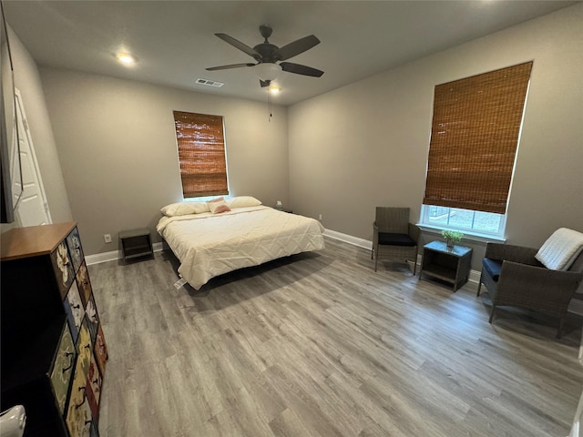 2813 Catfish Ct, Granbury, TX 76048 - bedroom with wood finished floors, a ceiling fan, and recessed lighting