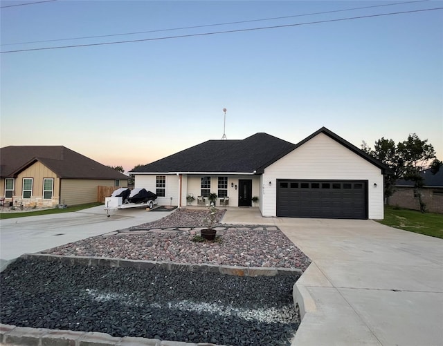 ranch-style home with a garage