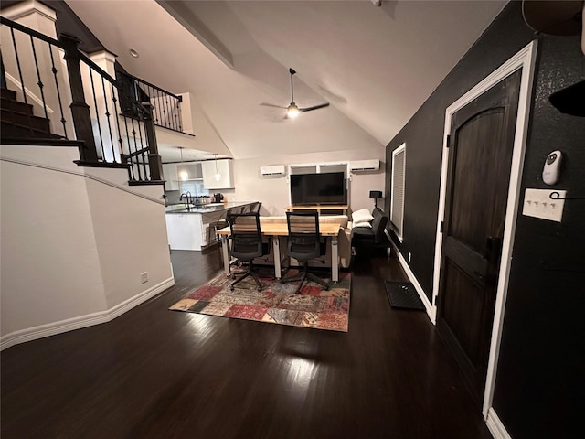 dining space featuring dark wood-style floors, ceiling fan, a wall mounted air conditioner, baseboards, and stairs