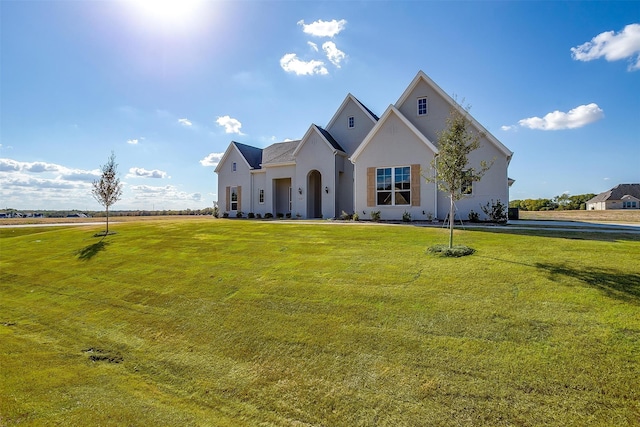 view of front of property with a front yard