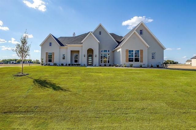 view of front facade with a front lawn