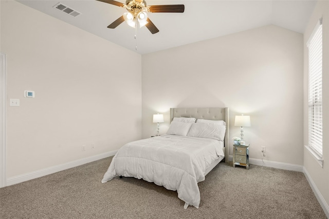 11024 Los Alamos Dr, Aubrey, TX 76227 - carpeted bedroom featuring vaulted ceiling, multiple windows, baseboards, and ceiling fan
