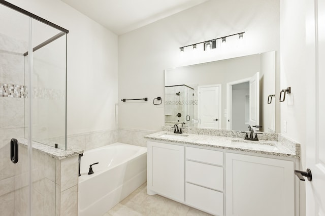 bathroom with vanity, shower with separate bathtub, and tile patterned floors