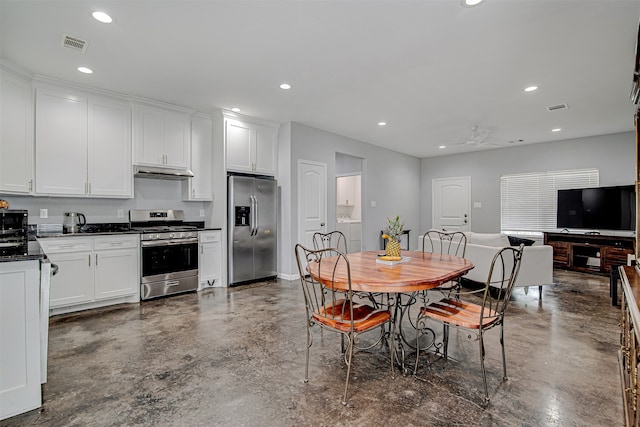 dining area with washer / dryer and ceiling fan