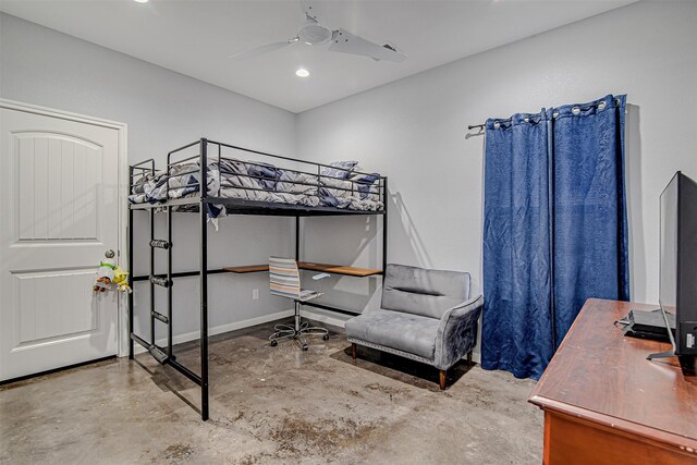 bedroom with concrete floors and ceiling fan