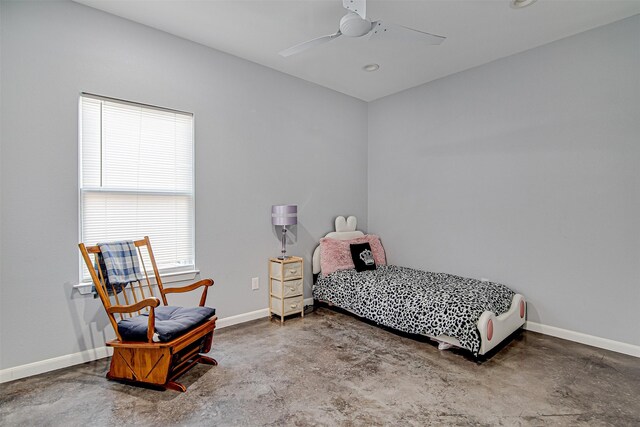 bedroom featuring concrete floors and ceiling fan