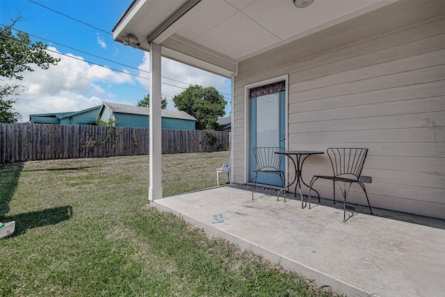 view of yard with a patio area and fence