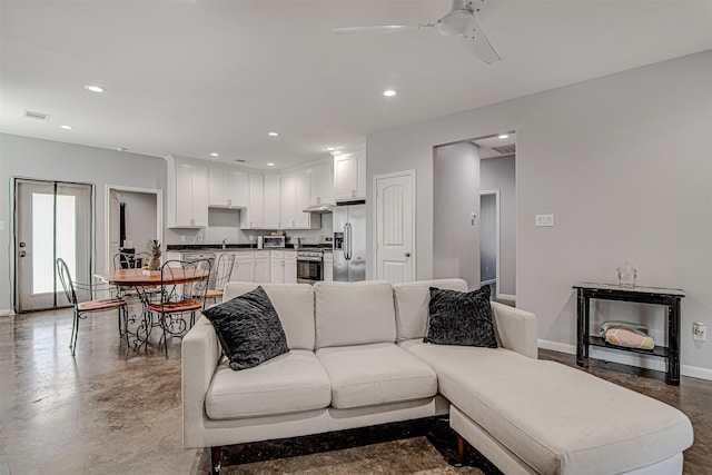 living room featuring ceiling fan