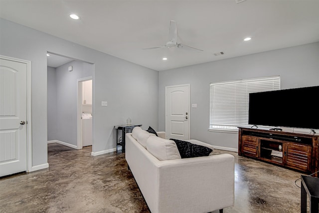 living area with finished concrete floors, recessed lighting, ceiling fan, and baseboards