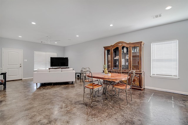 dining room with ceiling fan, recessed lighting, visible vents, baseboards, and finished concrete flooring