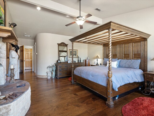 bedroom featuring ceiling fan and dark hardwood / wood-style flooring