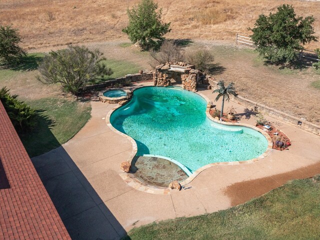 view of pool featuring a patio area