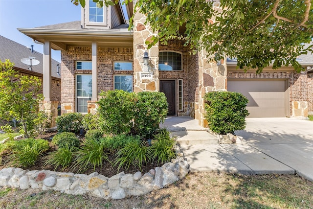 view of front of property featuring a garage