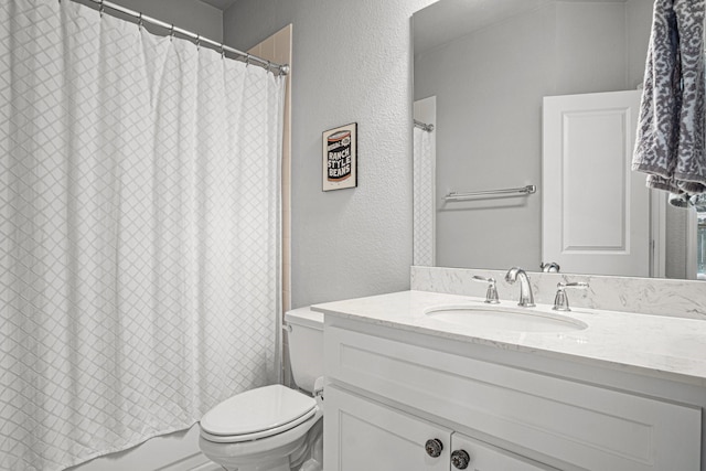 full bathroom featuring toilet, shower / bathtub combination with curtain, and vanity