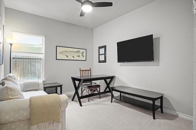 office space with light colored carpet and ceiling fan