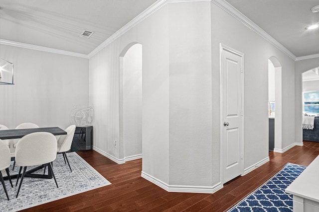 office with crown molding and dark wood-type flooring