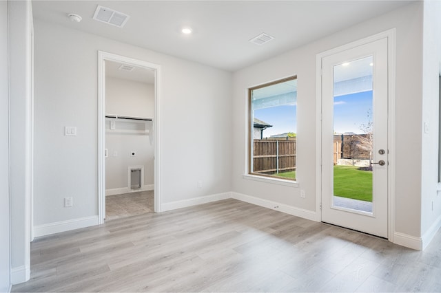 interior space with light hardwood / wood-style floors