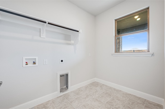 clothes washing area with hookup for an electric dryer, light tile patterned floors, and hookup for a washing machine