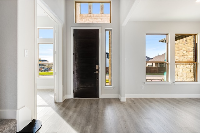 entryway with light hardwood / wood-style flooring