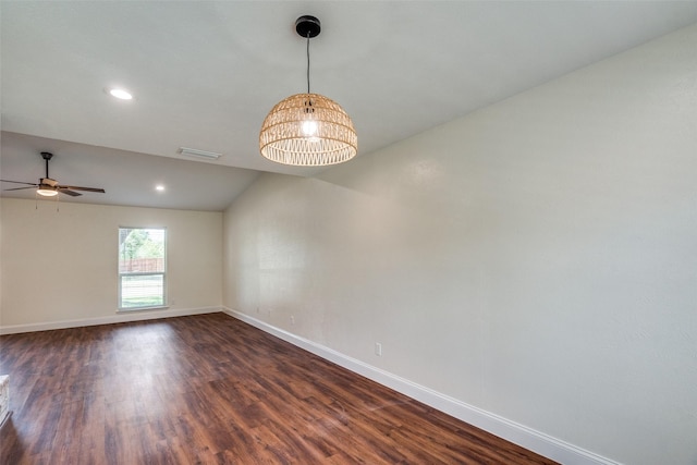 unfurnished room featuring ceiling fan and dark hardwood / wood-style floors