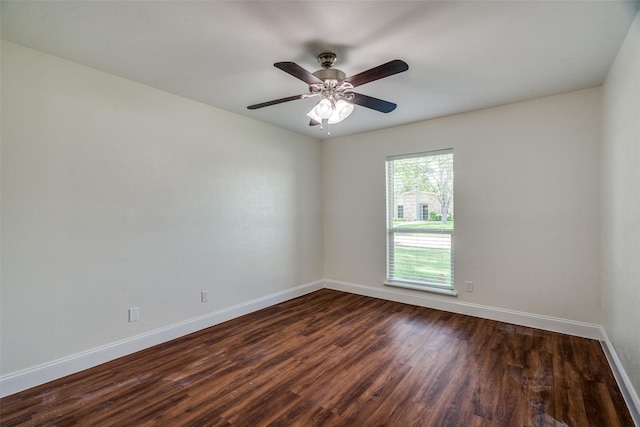 unfurnished room featuring ceiling fan and dark hardwood / wood-style floors