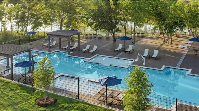 view of swimming pool featuring a gazebo and a patio area