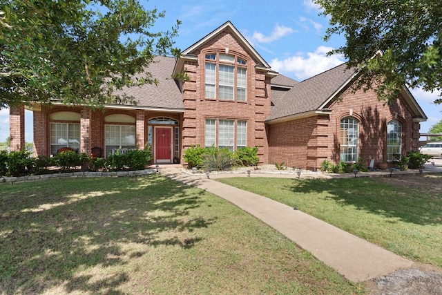 front facade with a front lawn