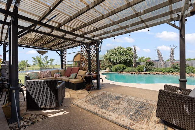 view of swimming pool featuring a pergola, an outdoor living space, and a patio