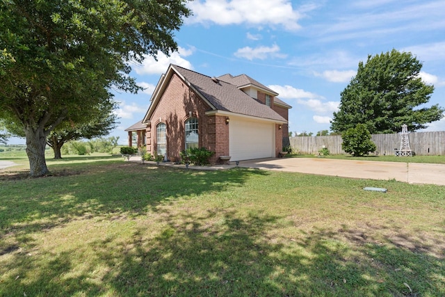 view of side of home with a lawn and a garage