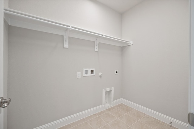 laundry area featuring hookup for a washing machine, light tile patterned floors, gas dryer hookup, and hookup for an electric dryer