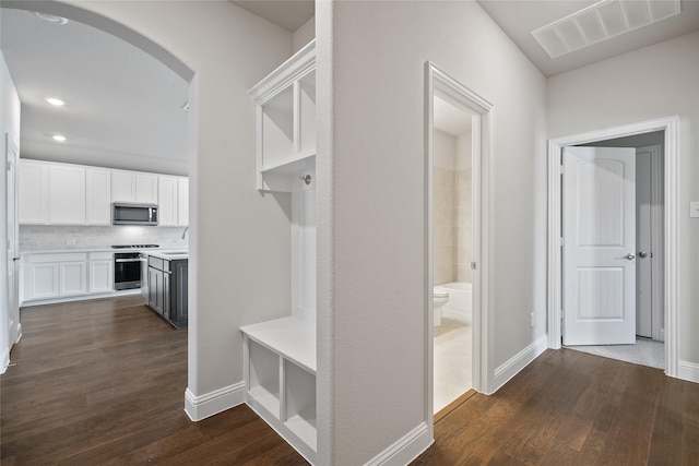 mudroom featuring dark hardwood / wood-style floors