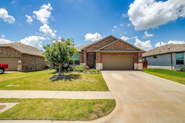 view of front facade featuring a garage and a front lawn