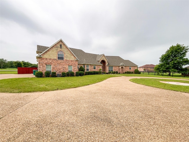 view of front of home with a front lawn