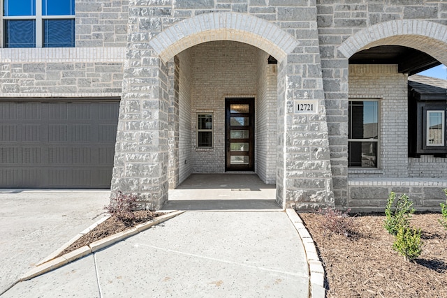 entrance to property featuring a garage