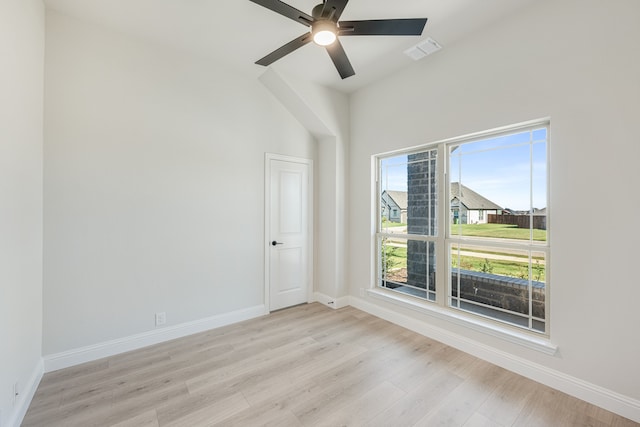 spare room with light hardwood / wood-style floors and ceiling fan