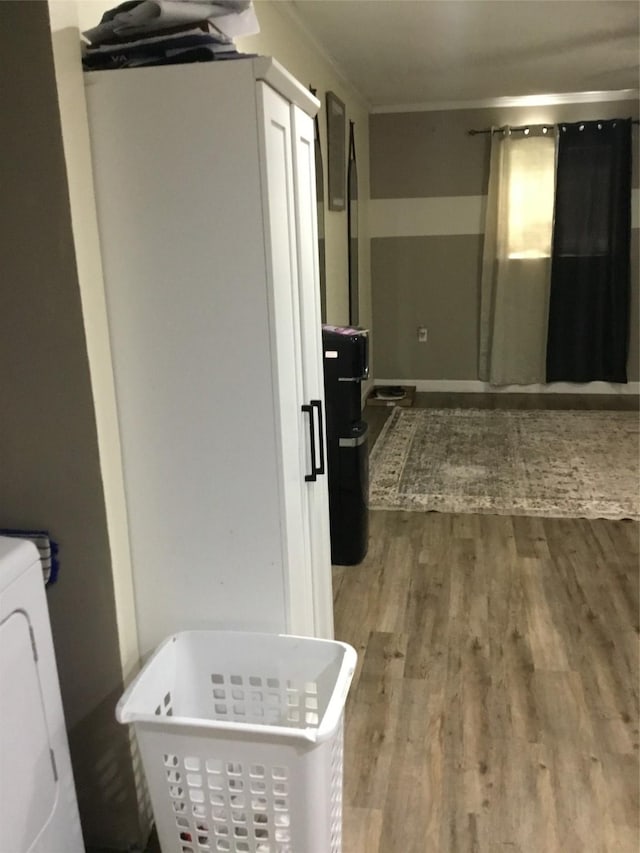 interior space featuring hardwood / wood-style flooring and washer / clothes dryer