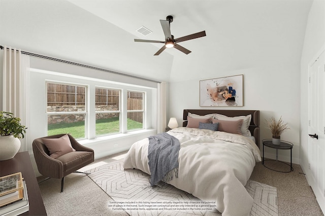 carpeted bedroom with lofted ceiling and ceiling fan